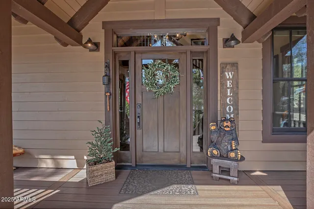 an aerial view of residential house and green space