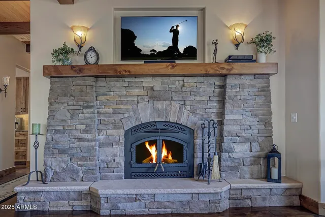 a kitchen with stainless steel appliances granite countertop a stove and cabinets