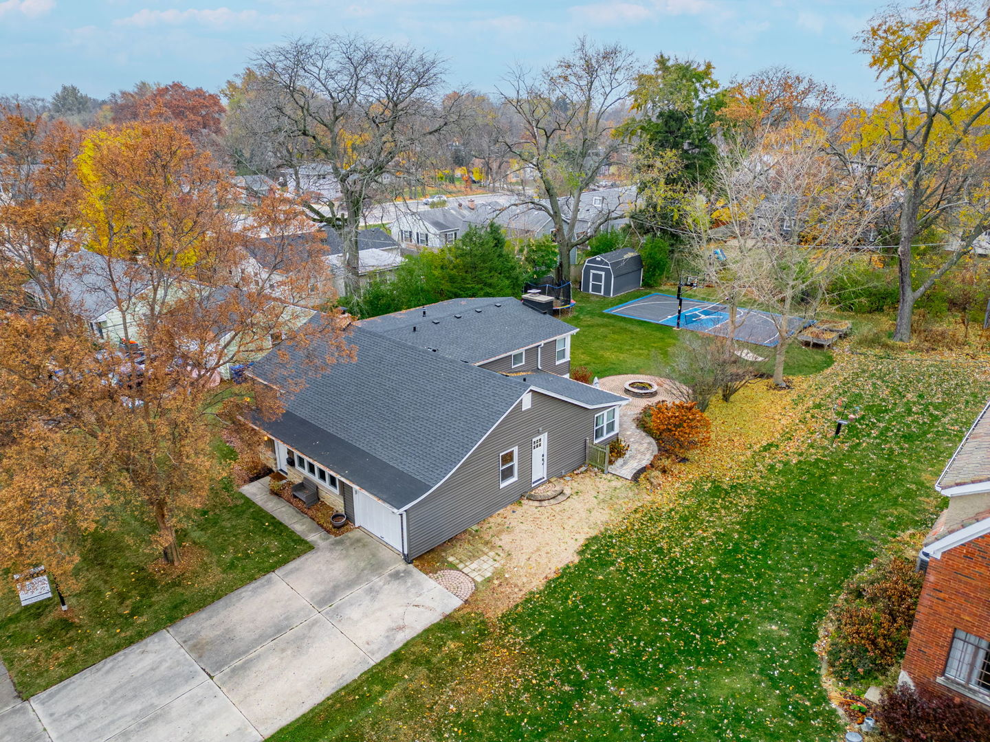 620 Crest Street Wheaton, IL 60187 - Photo 1 of 44 an aerial view of a house with backyard space and balcony