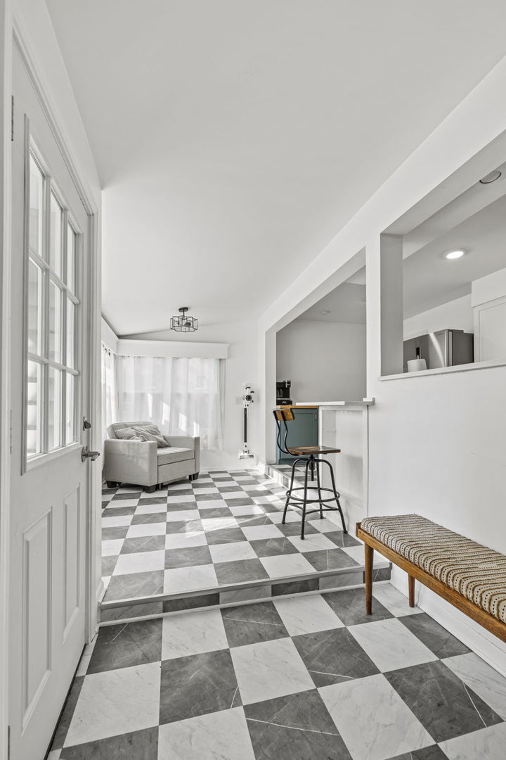 620 Crest Street Wheaton, IL 60187 - Photo 18 of 44 a bedroom with furniture and a window