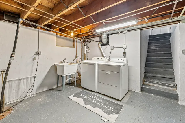 a utility room with cabinets