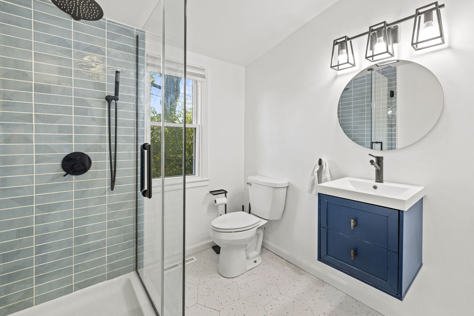 620 Crest Street Wheaton, IL 60187 - Photo 32 of 44 a bathroom with a toilet sink and shower