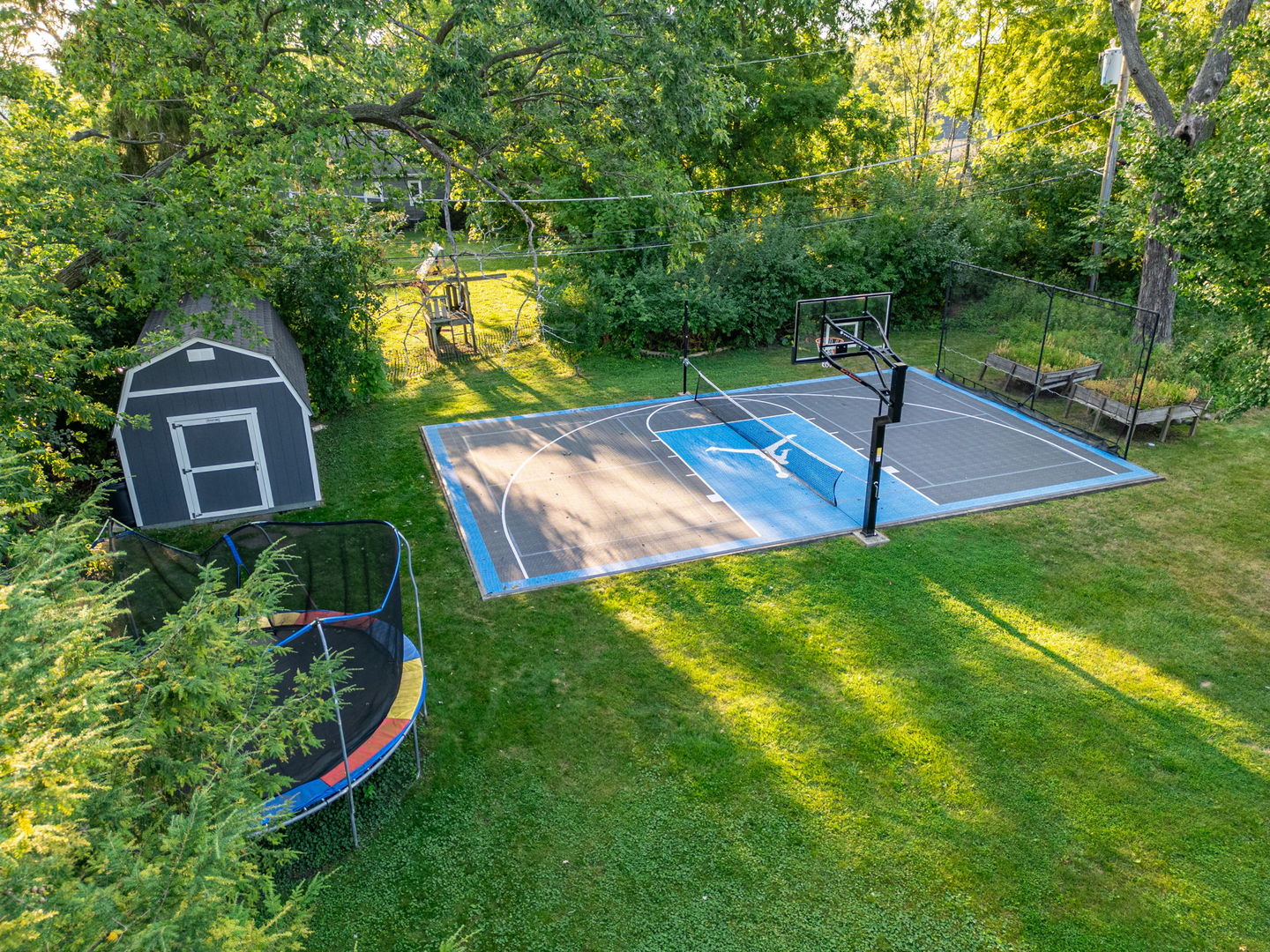 620 Crest Street Wheaton, IL 60187 - Photo 36 of 44 a view of a garden with a slide