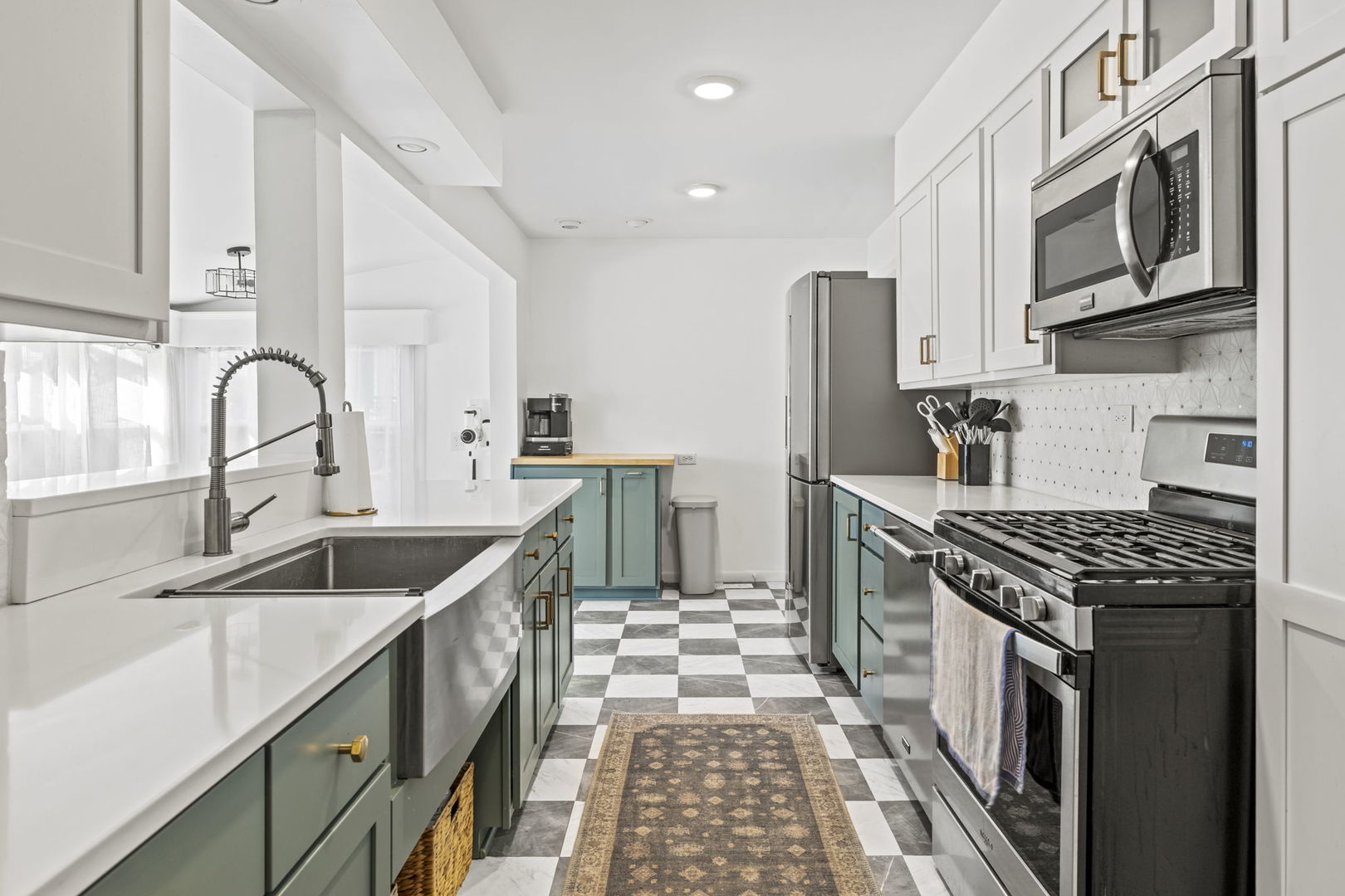 620 Crest Street Wheaton, IL 60187 - Photo 6 of 44 a kitchen with stainless steel appliances granite countertop a sink stove and refrigerator