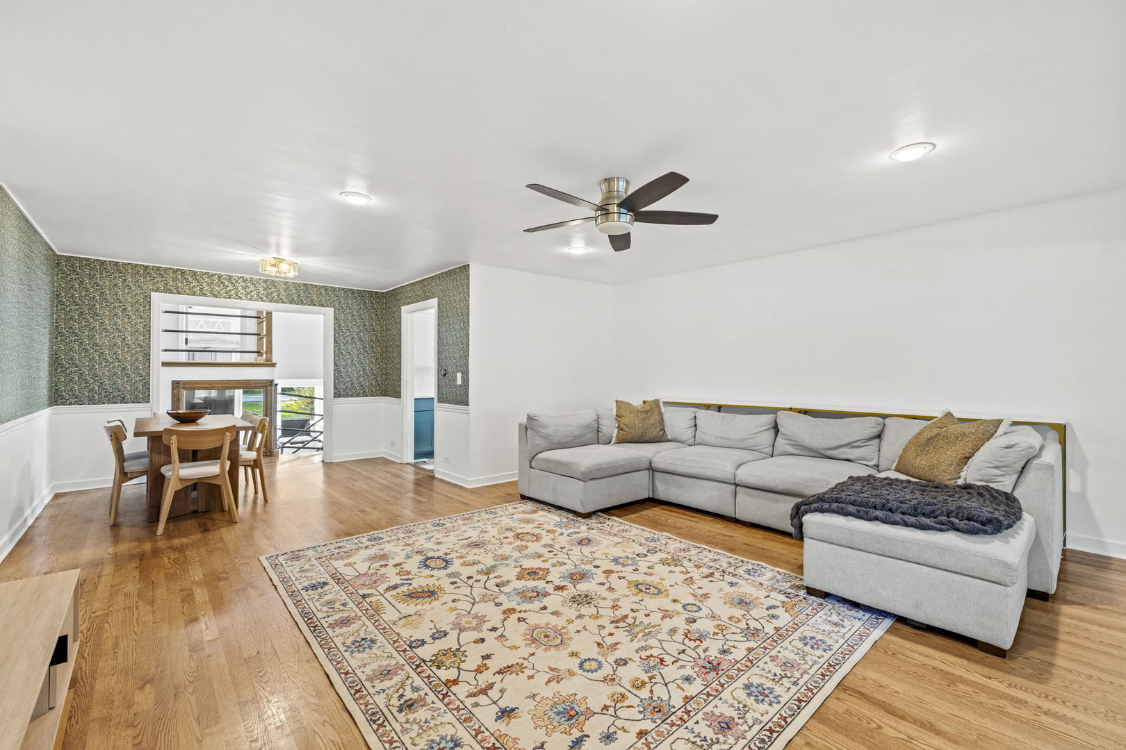 620 Crest Street Wheaton, IL 60187 - Photo 7 of 44 a living room with furniture and a wooden floor