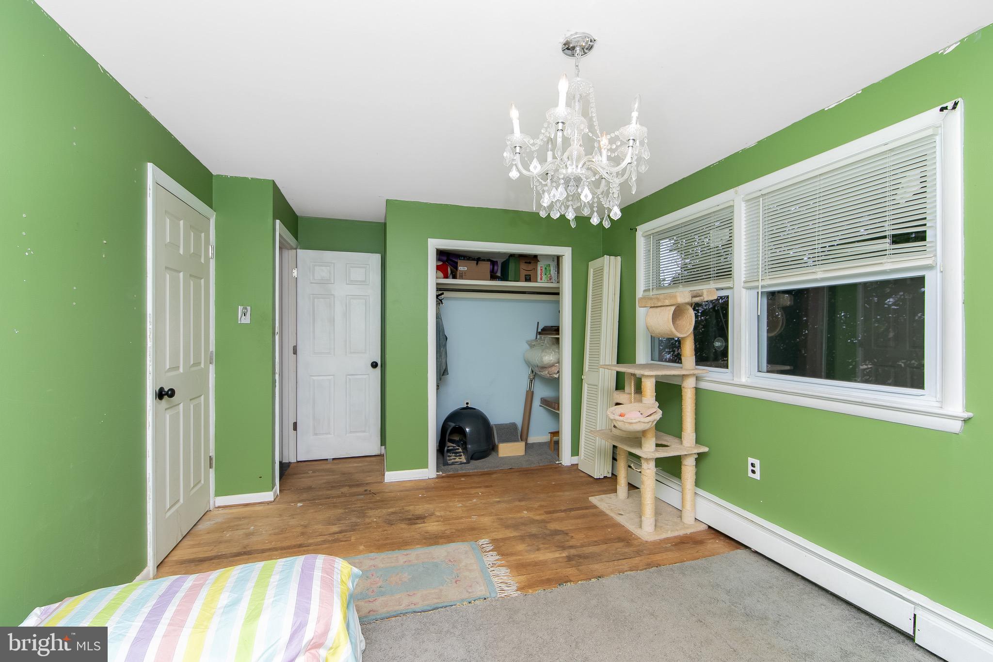 15 East Spring Street Pine Hill, NJ 08021 - Photo 19 of 38 a bedroom with a bed and a window