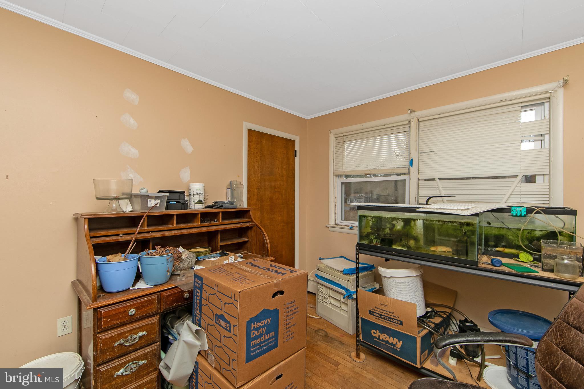15 East Spring Street Pine Hill, NJ 08021 - Photo 22 of 38 a room with furniture