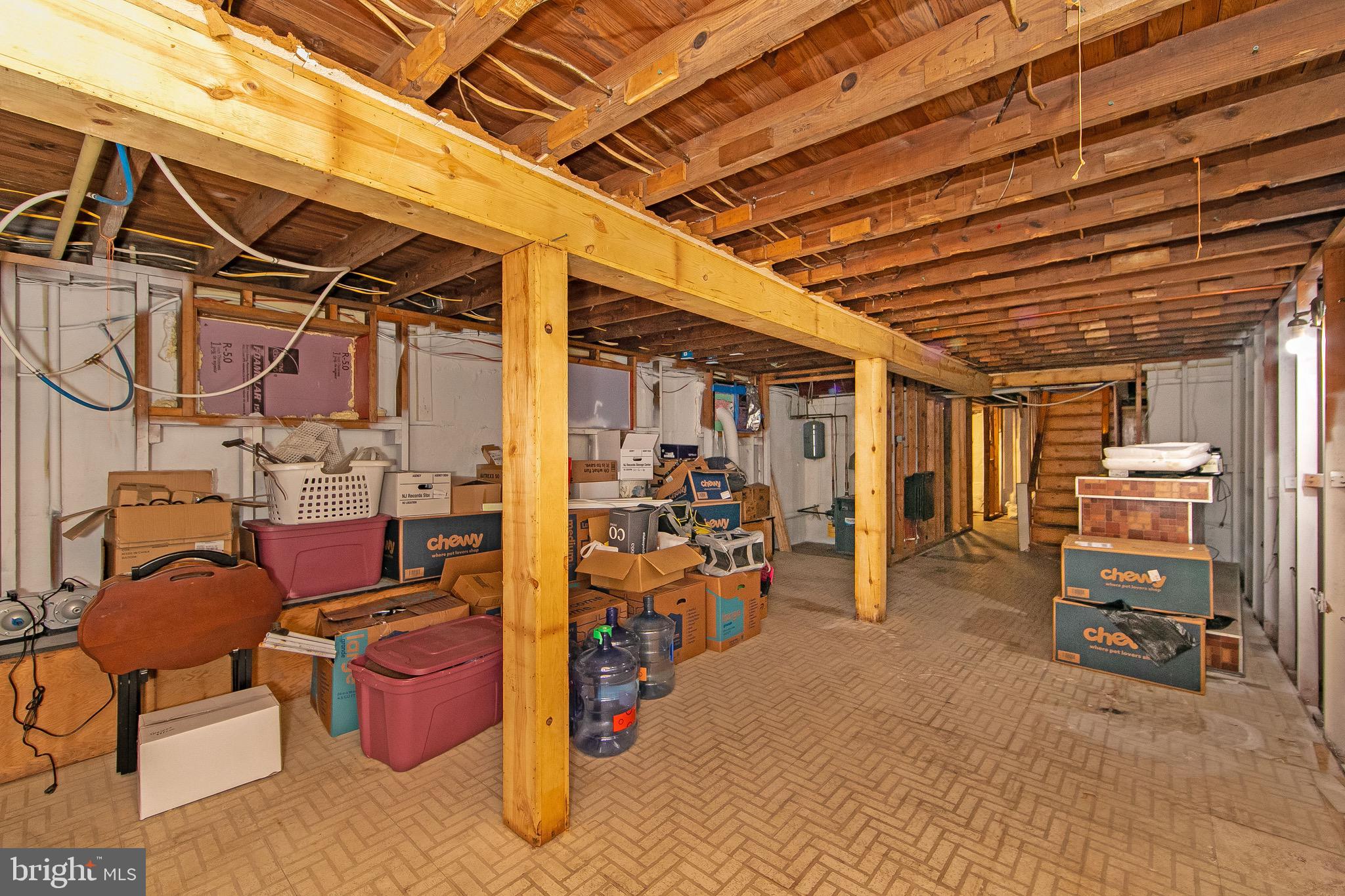 15 East Spring Street Pine Hill, NJ 08021 - Photo 24 of 38 a view of a storage room with shelves