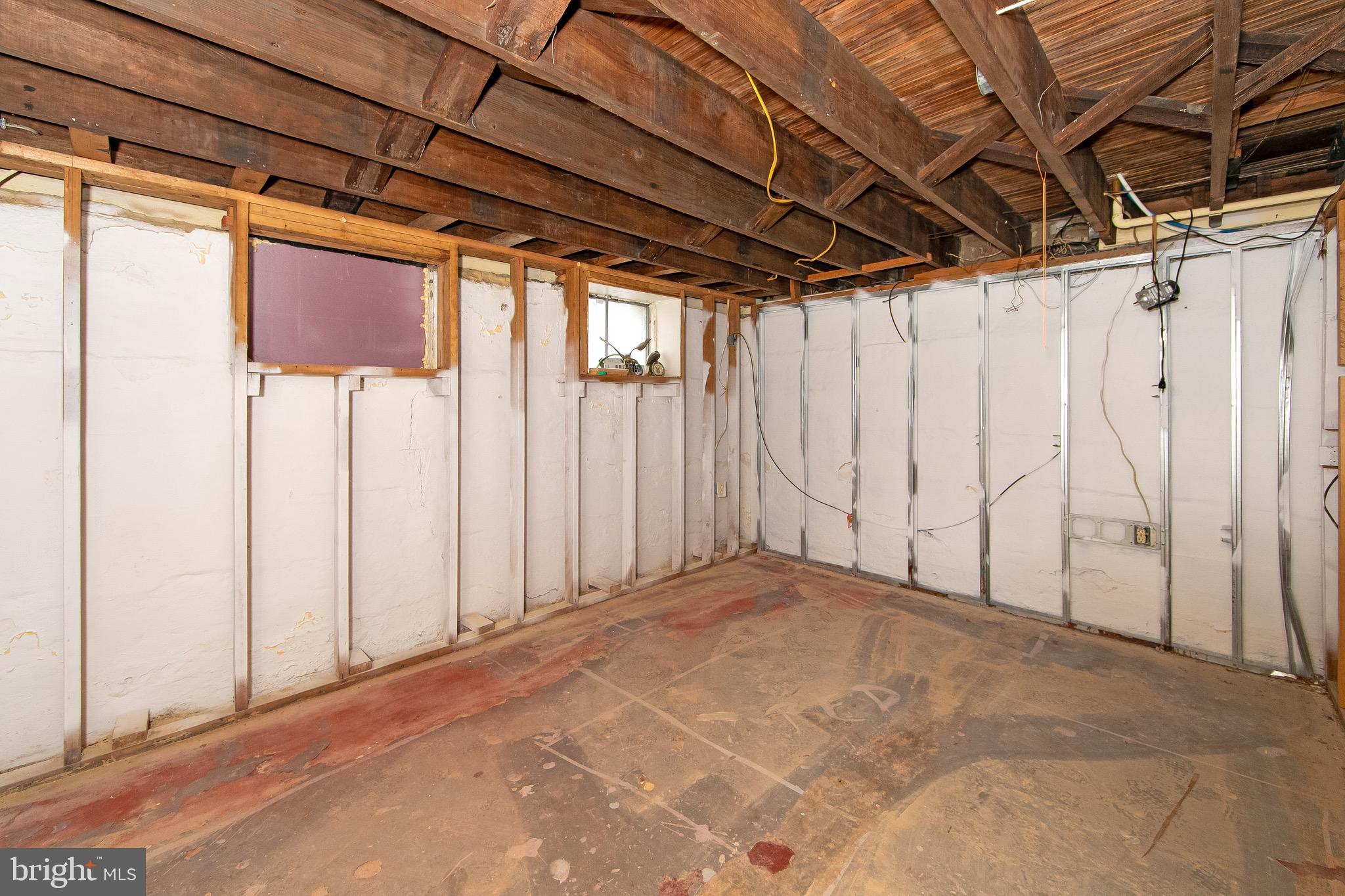 15 East Spring Street Pine Hill, NJ 08021 - Photo 27 of 38 a view of a room with wooden walls and a wooden roof