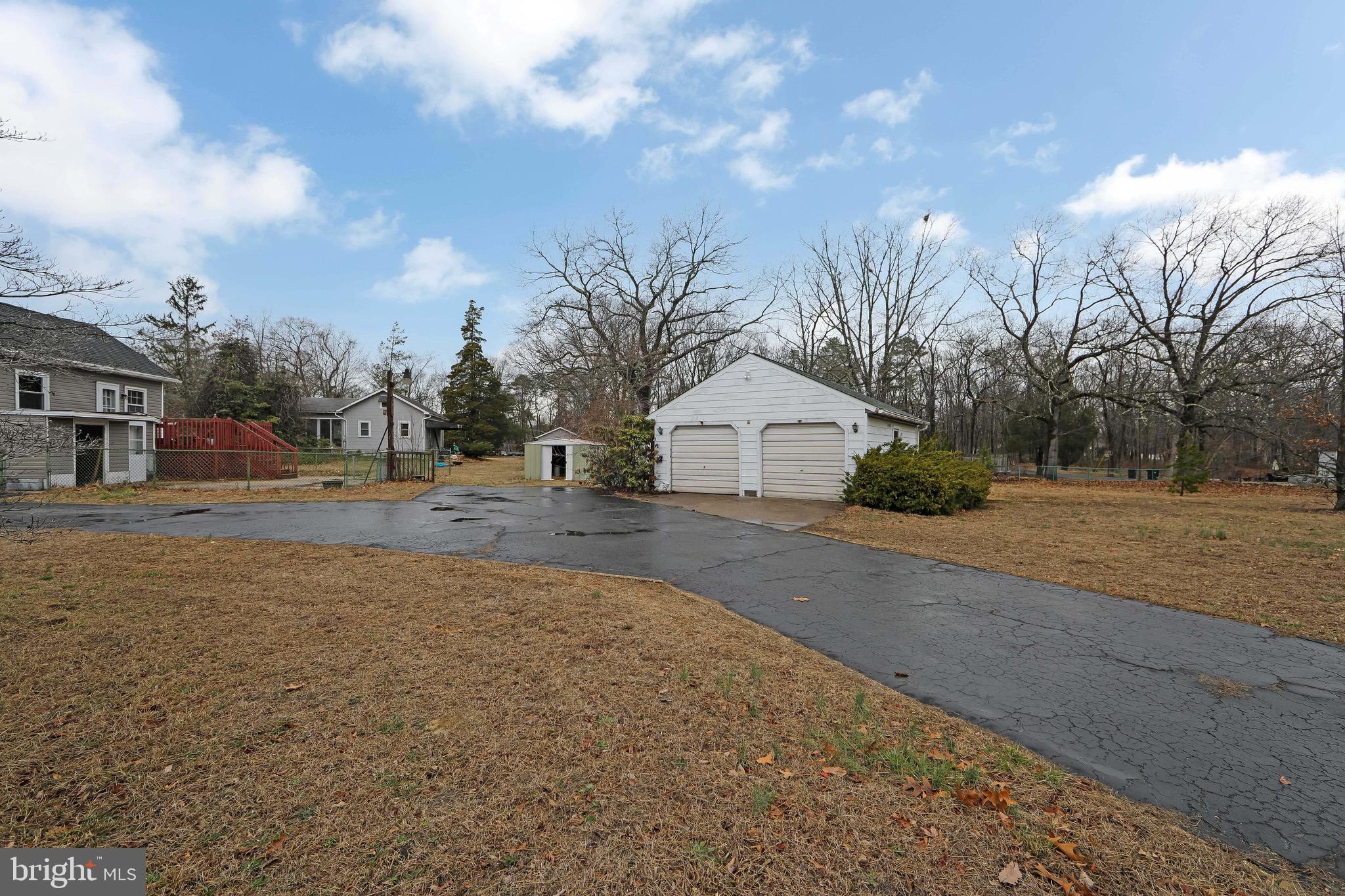 15 East Spring Street Pine Hill, NJ 08021 - Photo 31 of 38 a view of road and view of residential houses