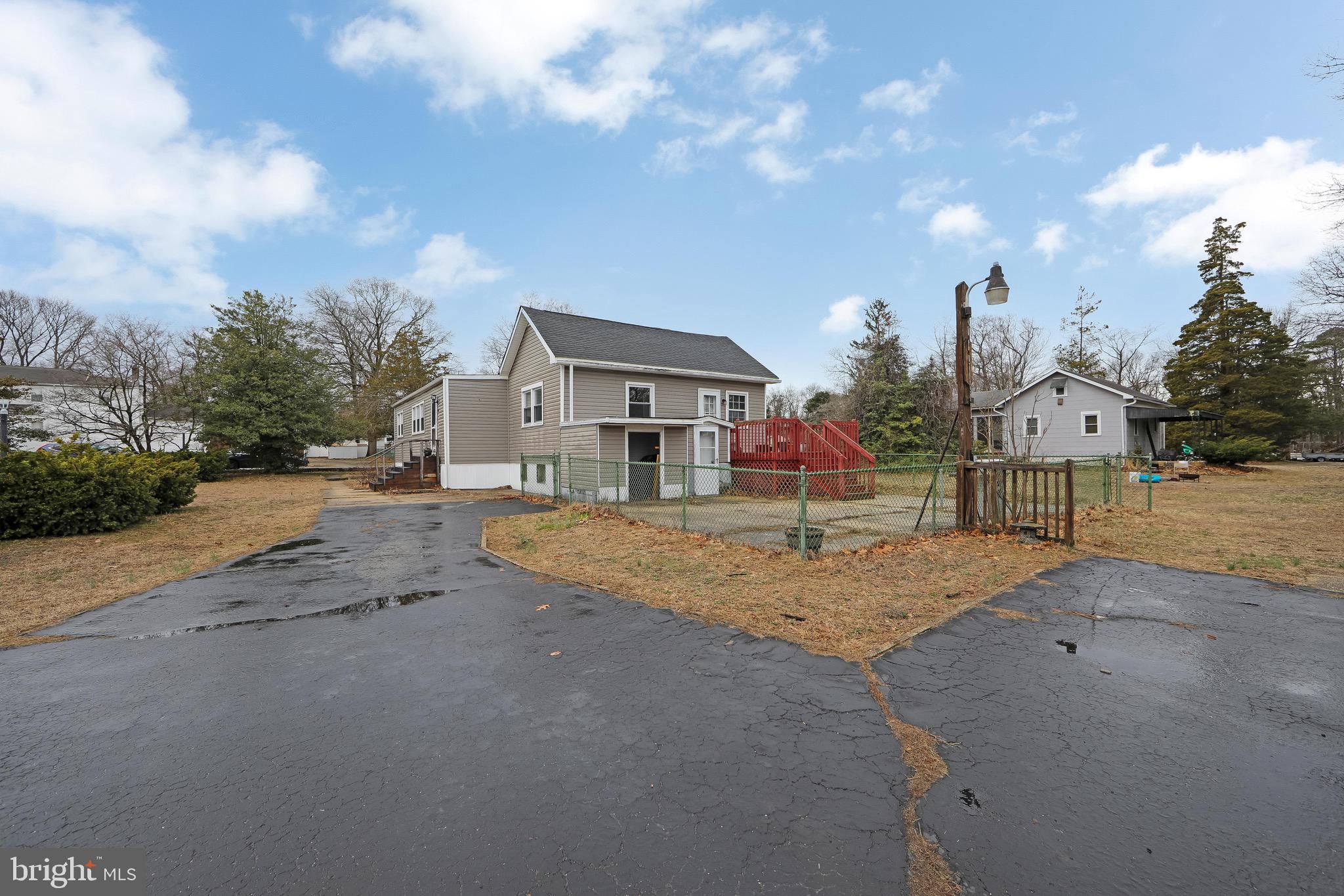 15 East Spring Street Pine Hill, NJ 08021 - Photo 33 of 38 a view of a house with a yard and street view