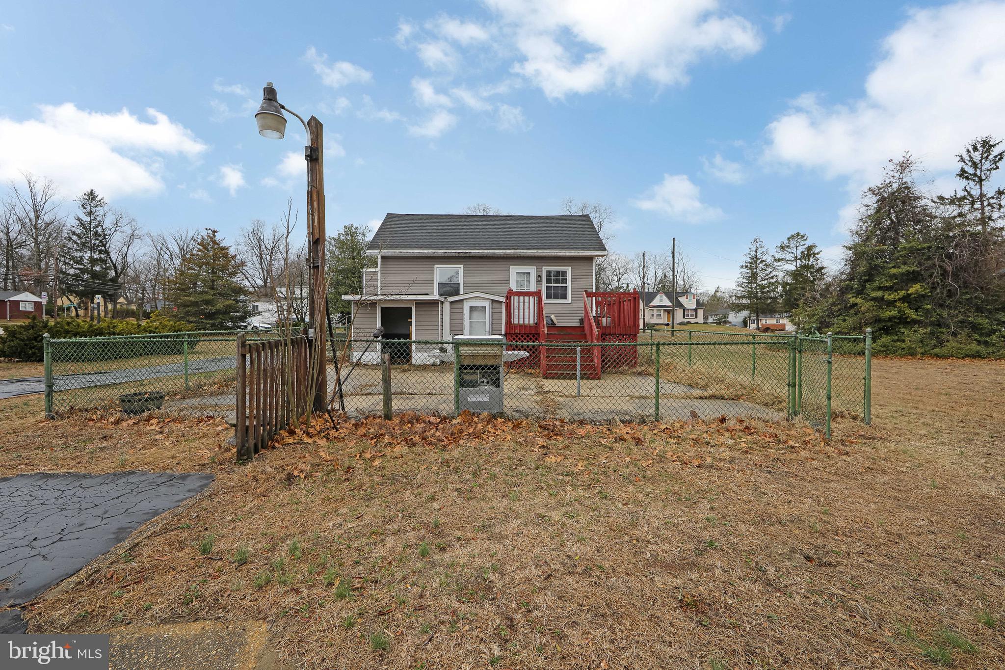 15 East Spring Street Pine Hill, NJ 08021 - Photo 35 of 38 a house view with a lake view