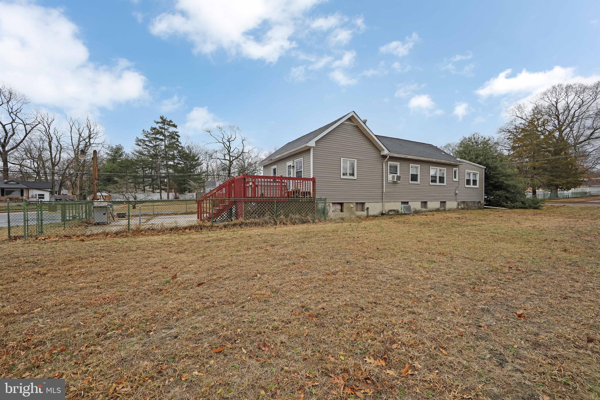 15 East Spring Street Pine Hill, NJ 08021 - Photo 37 of 38 a view of a house with a yard
