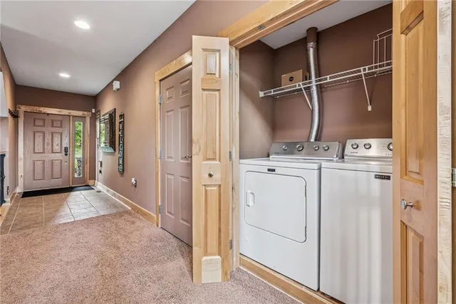 a living room with furniture and flat screen tv