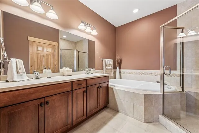 a bedroom with a bed and a tv