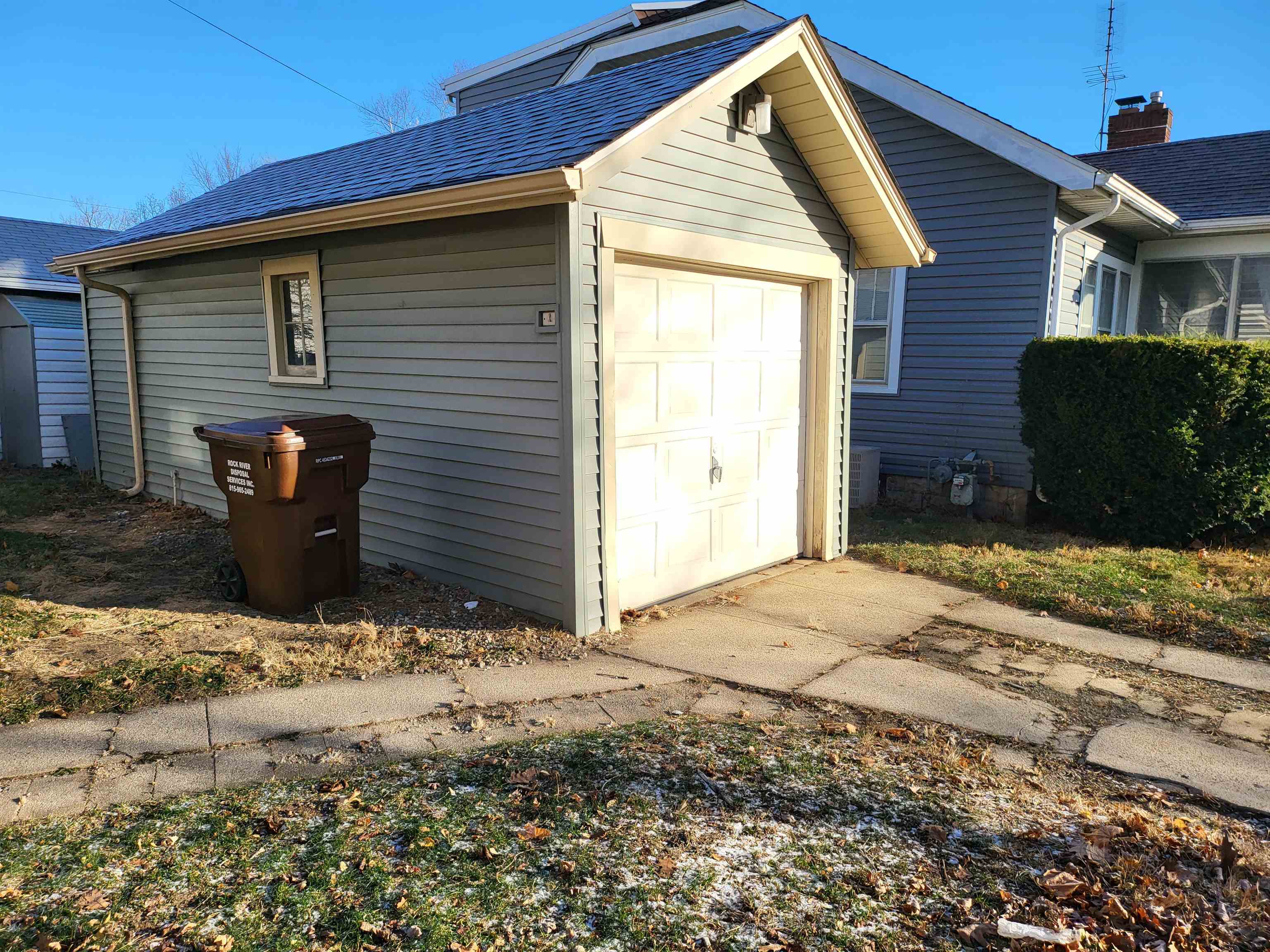 1803 Ridge Avenue Rockford, IL 61103 - Photo 2 of 11 a view of a house with a yard