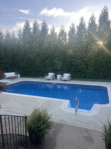 a view of balcony with wooden floor