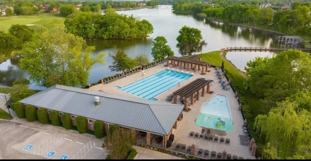 a view of a house with a outdoor space and seating area