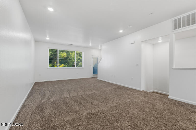 285 Mark Jeffrey Lane Reno, NV 89503 - Photo 8 of 20 an empty room with windows