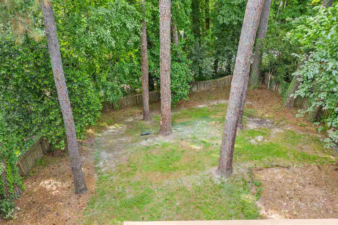 2618 Van Dyke Avenue Raleigh, NC 27607 - Photo 30 of 30 The backyard has shade trees and room to roam. Plenty of space to add a garage as well! Yard