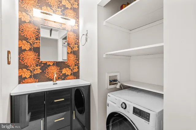 a bathroom with a shower a toilet and a sink