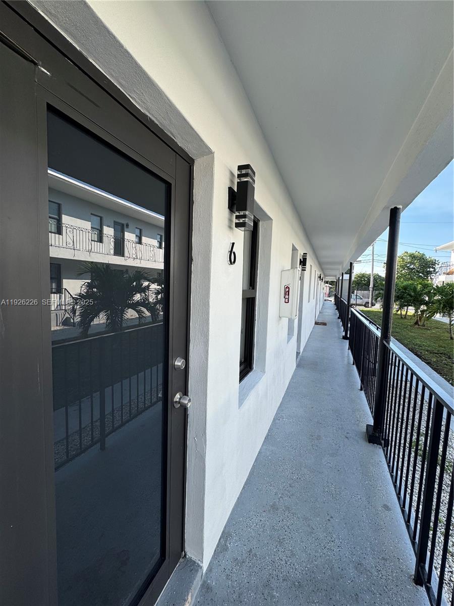 1969 Northwest 2nd Court, Unit 6 Miami, FL 33136 - Photo 17 of 17 a view of a hallway