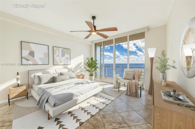 a bathroom with a granite countertop sink a toilet and a large mirror