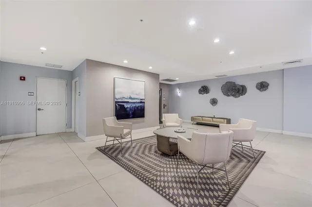 a view of a swimming pool with a patio and a garden