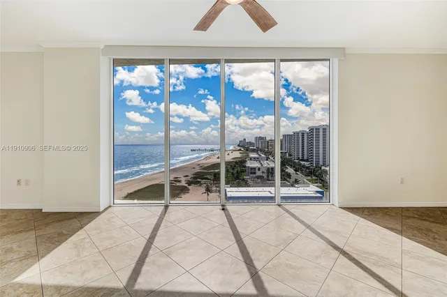 a view of swimming pool from a balcony