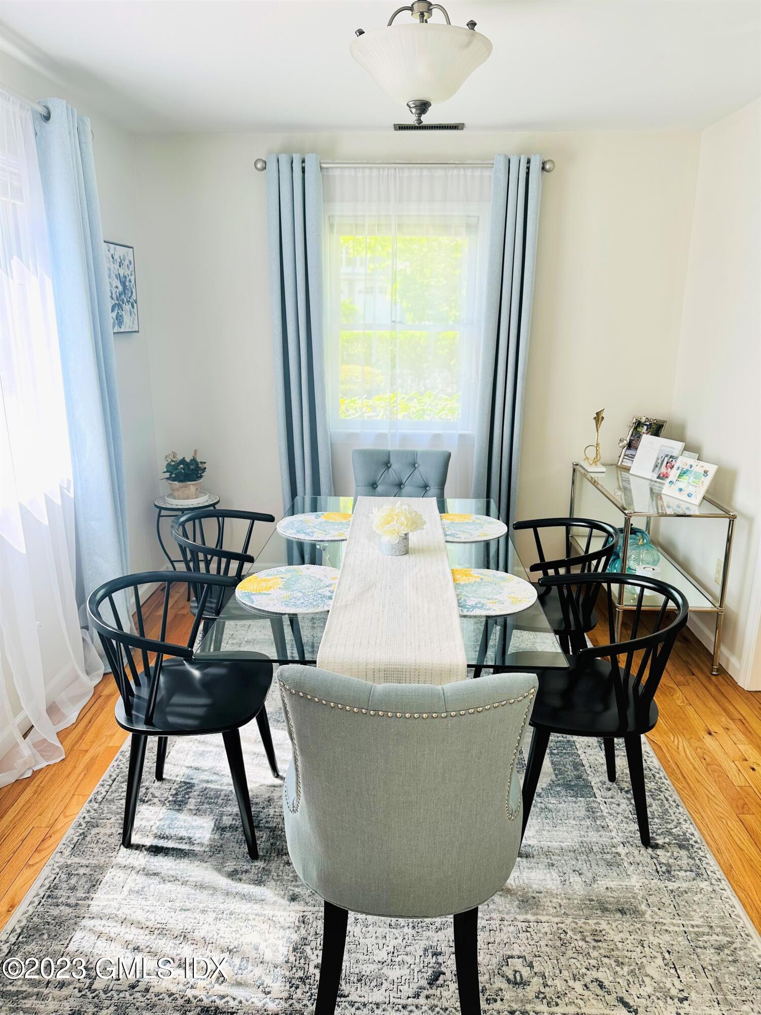 36 Morningside Drive Greenwich, CT 06830 - Photo 4 of 10 a living room with a table and a rug