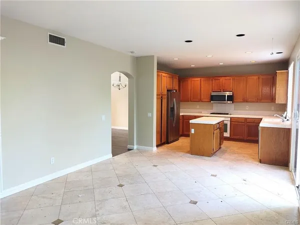 a view of a kitchen with a sink cabinets and a window