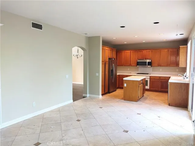 a view of a kitchen with a sink cabinets and a window