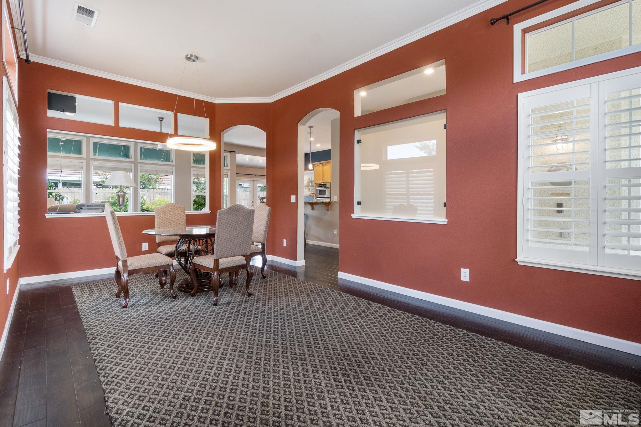9607 Glen Ridge Drive Reno, NV 89521 - Photo 13 of 22 a view of a dining room with furniture window and outside view