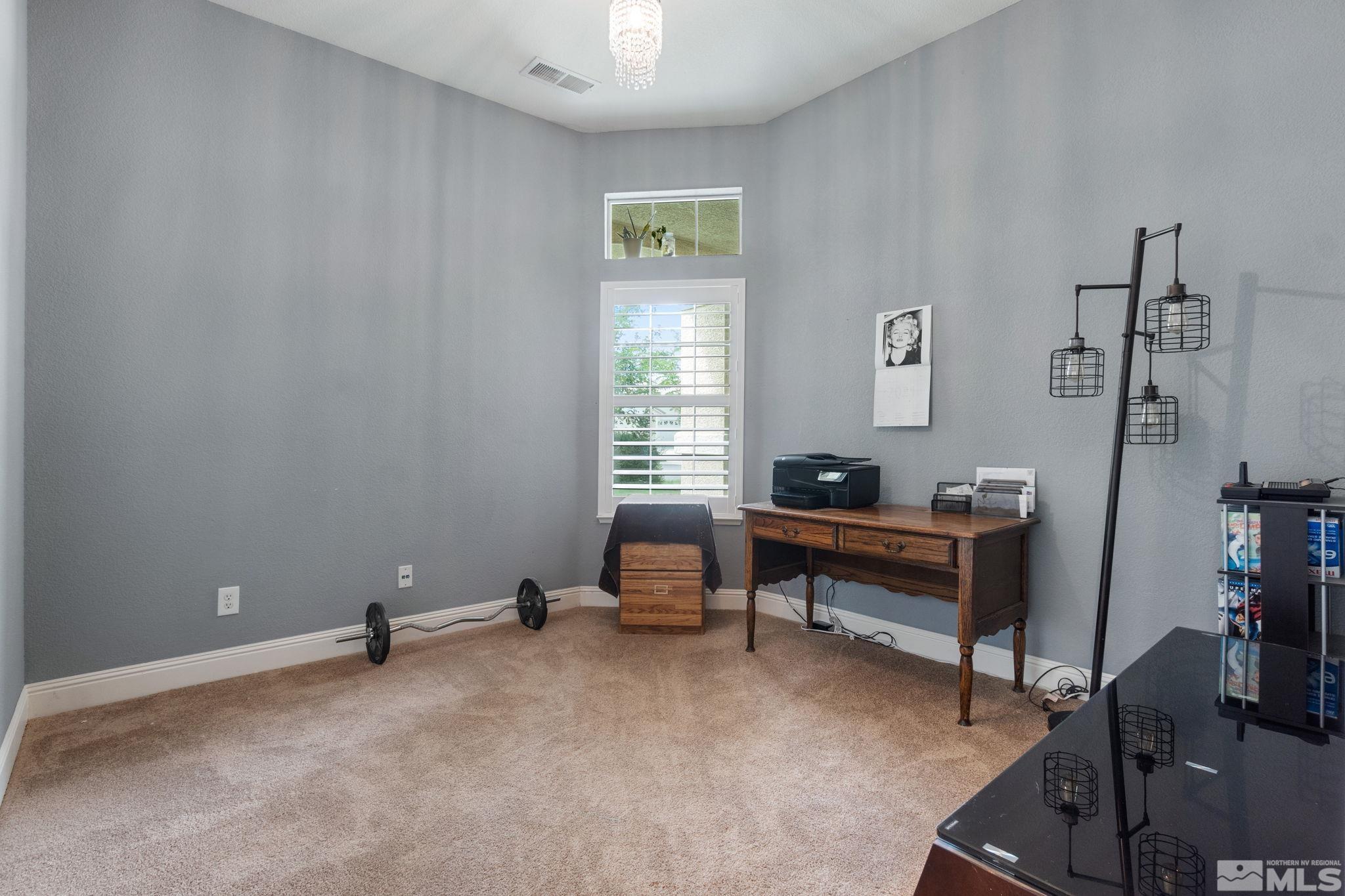 9607 Glen Ridge Drive Reno, NV 89521 - Photo 17 of 22 a living room with furniture and a window