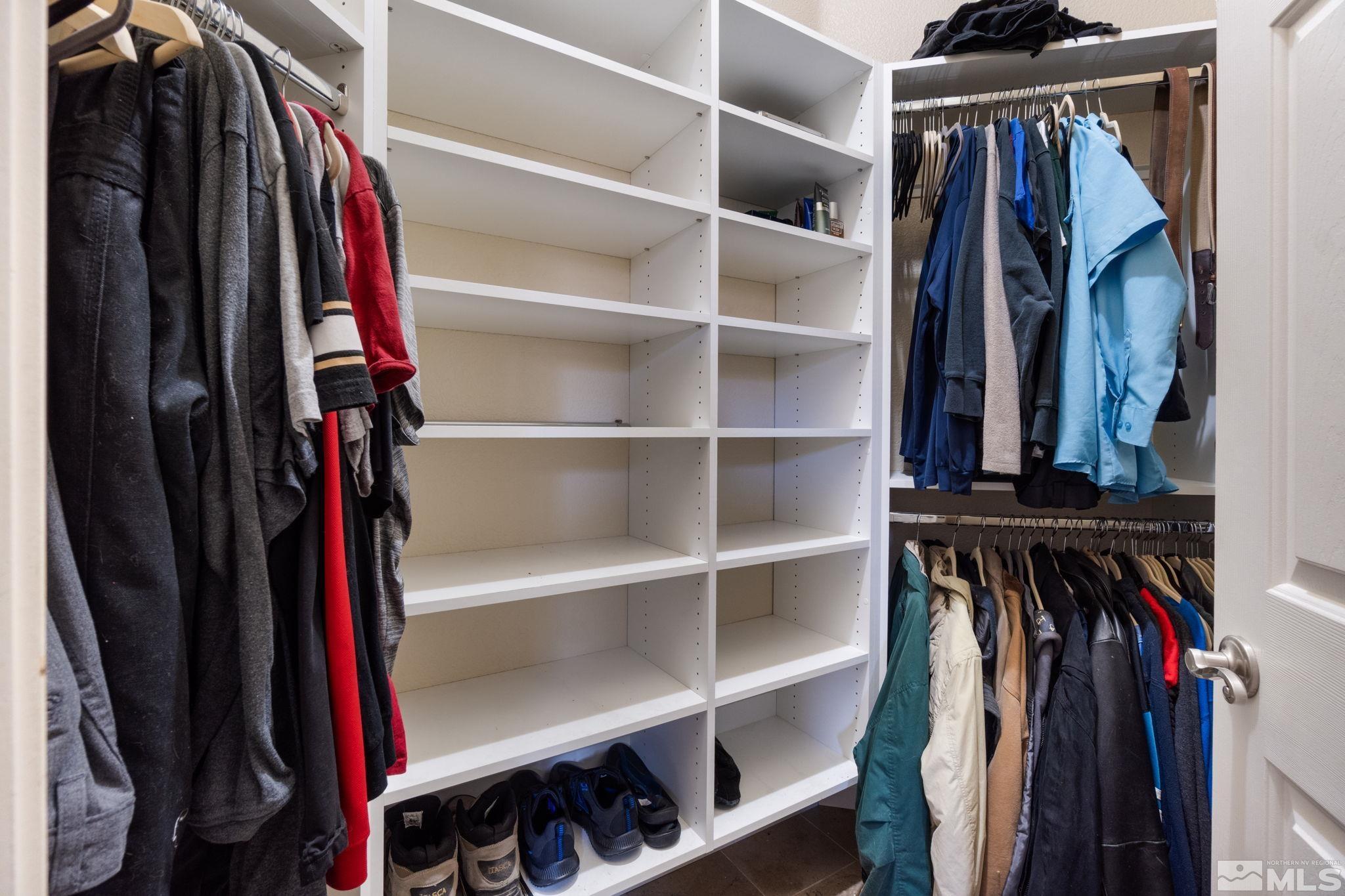 9607 Glen Ridge Drive Reno, NV 89521 - Photo 22 of 22 a view of walk in closet with clothes and shoes