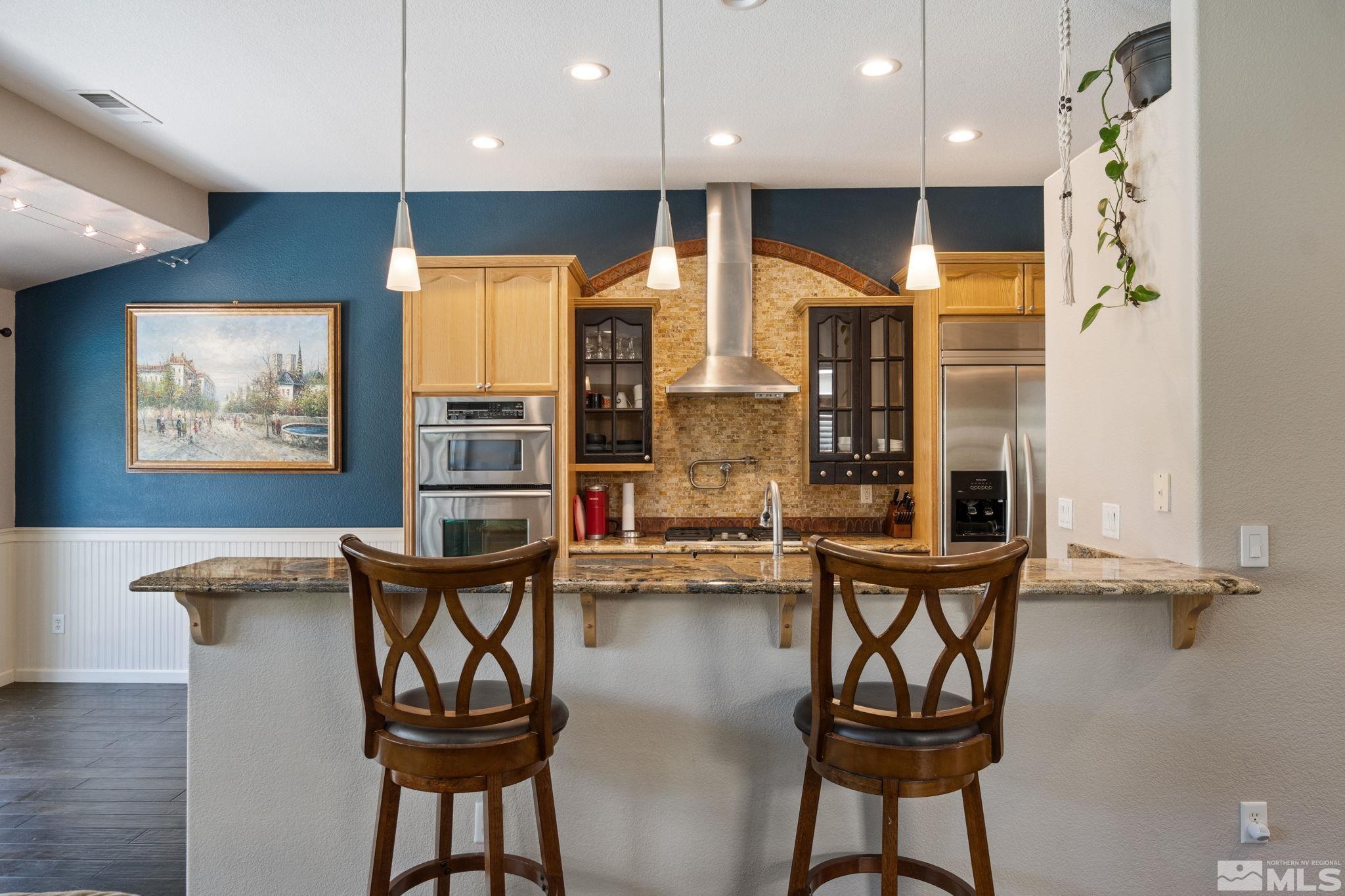 9607 Glen Ridge Drive Reno, NV 89521 - Photo 7 of 22 a view of a dining room with furniture