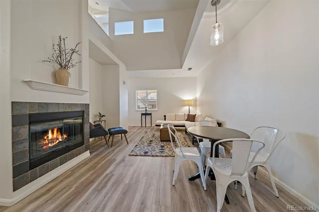 a view of a livingroom with furniture and a fireplace