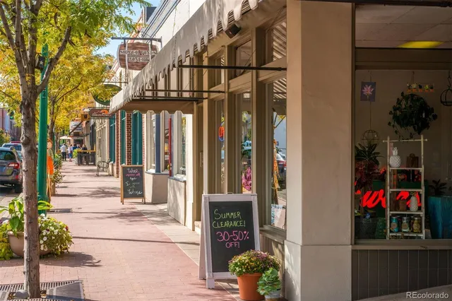 a front view of a building with traffic signal lights