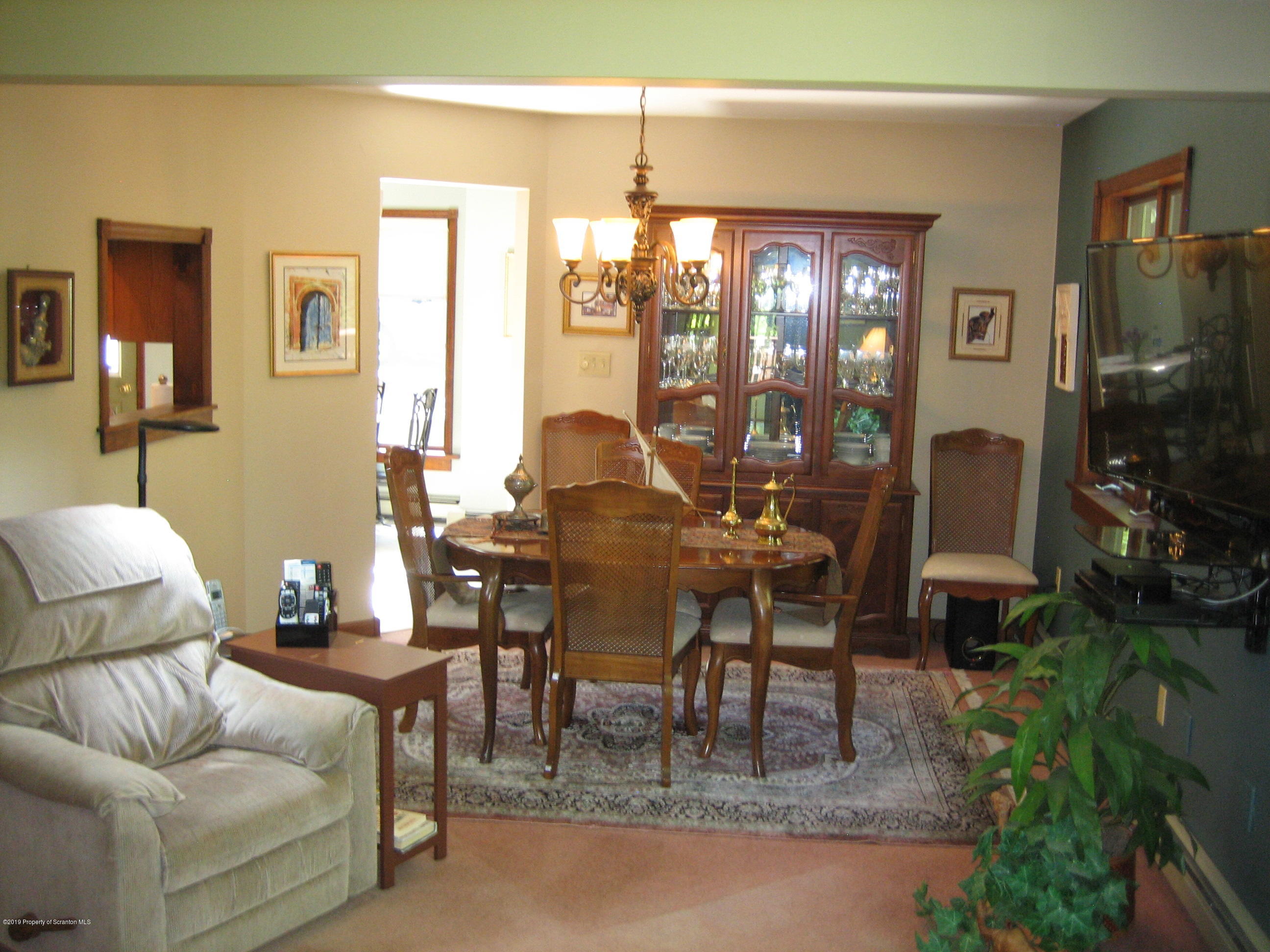 78 D Aberdeen Road Moscow, PA 18444 - Photo 11 of 70 a living room with furniture and a flat screen tv