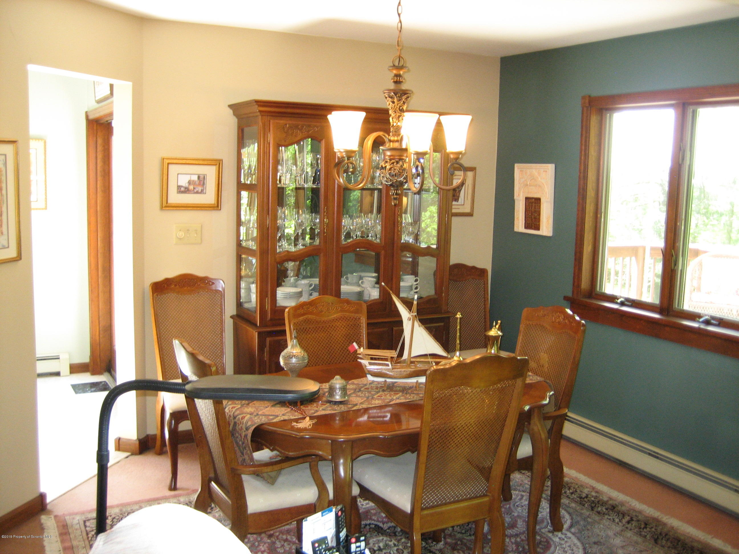 78 D Aberdeen Road Moscow, PA 18444 - Photo 12 of 70 a view of a dining room with furniture and window