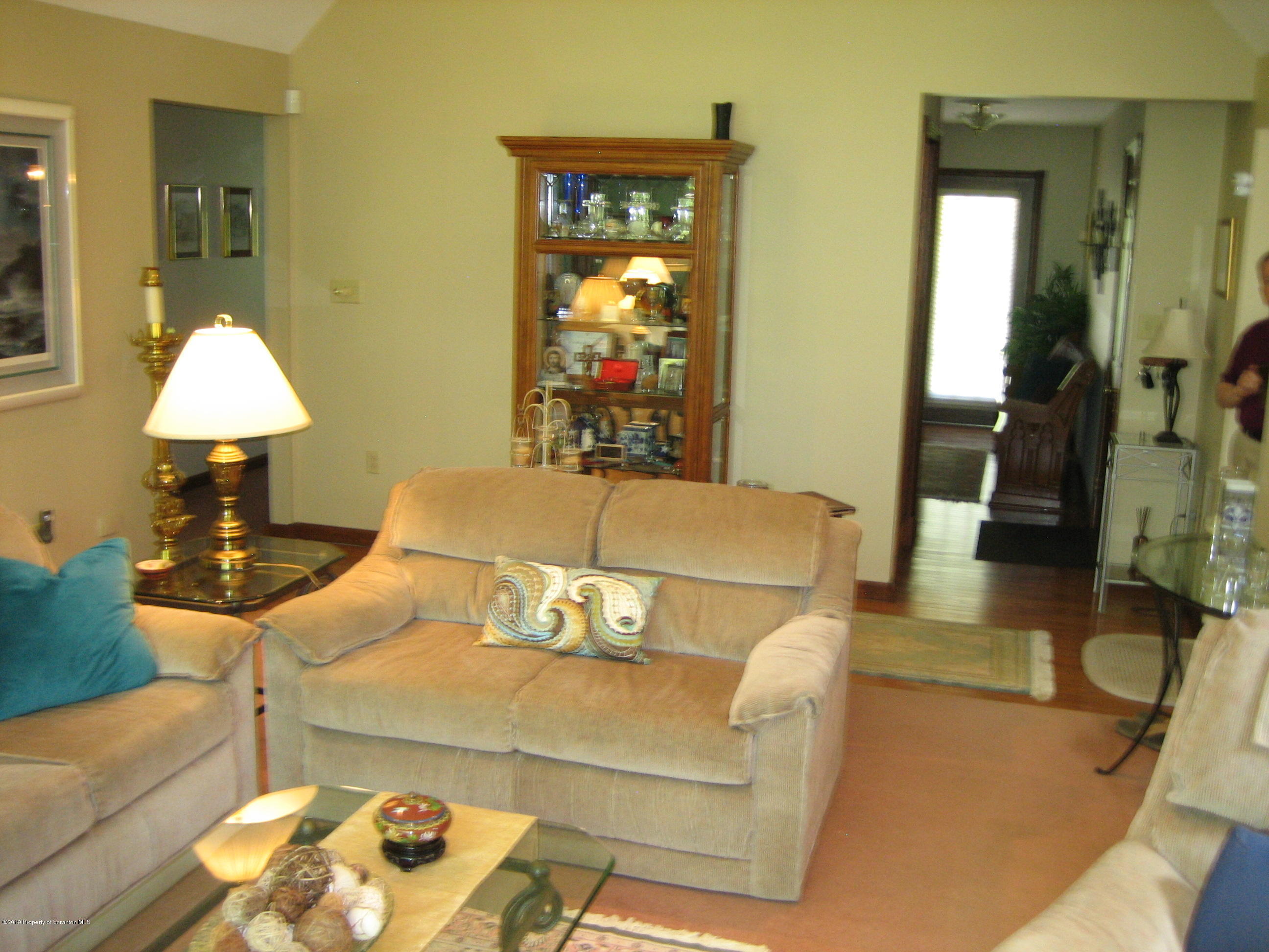 78 D Aberdeen Road Moscow, PA 18444 - Photo 13 of 70 a living room with furniture and a lamp
