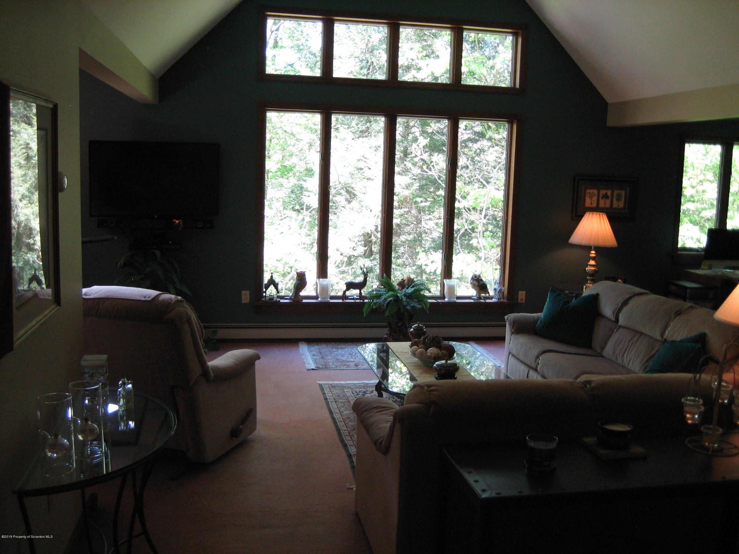 78 D Aberdeen Road Moscow, PA 18444 - Photo 16 of 70 a living room with furniture and a large window