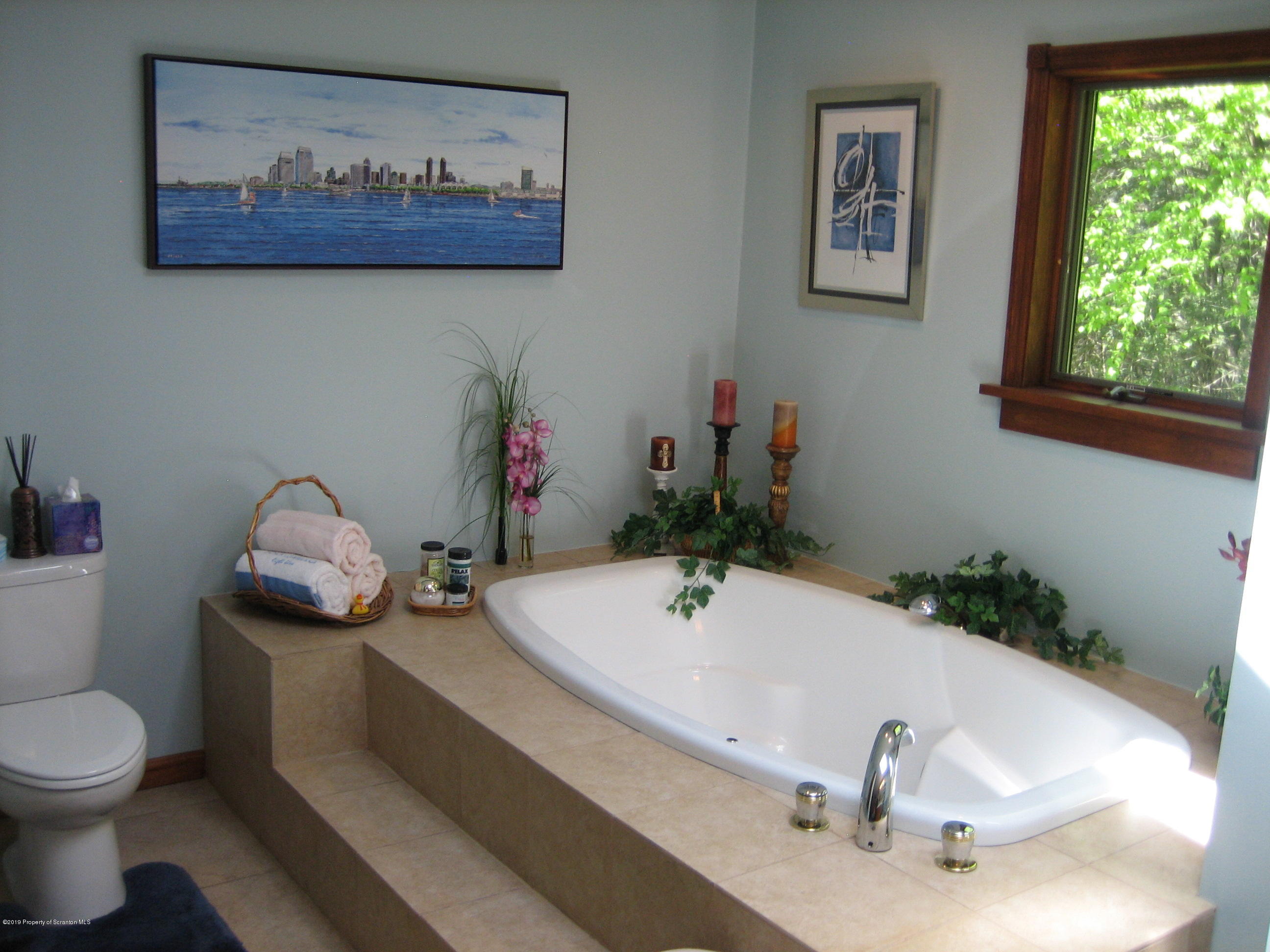 78 D Aberdeen Road Moscow, PA 18444 - Photo 21 of 70 a bathroom with a sink and a mirror
