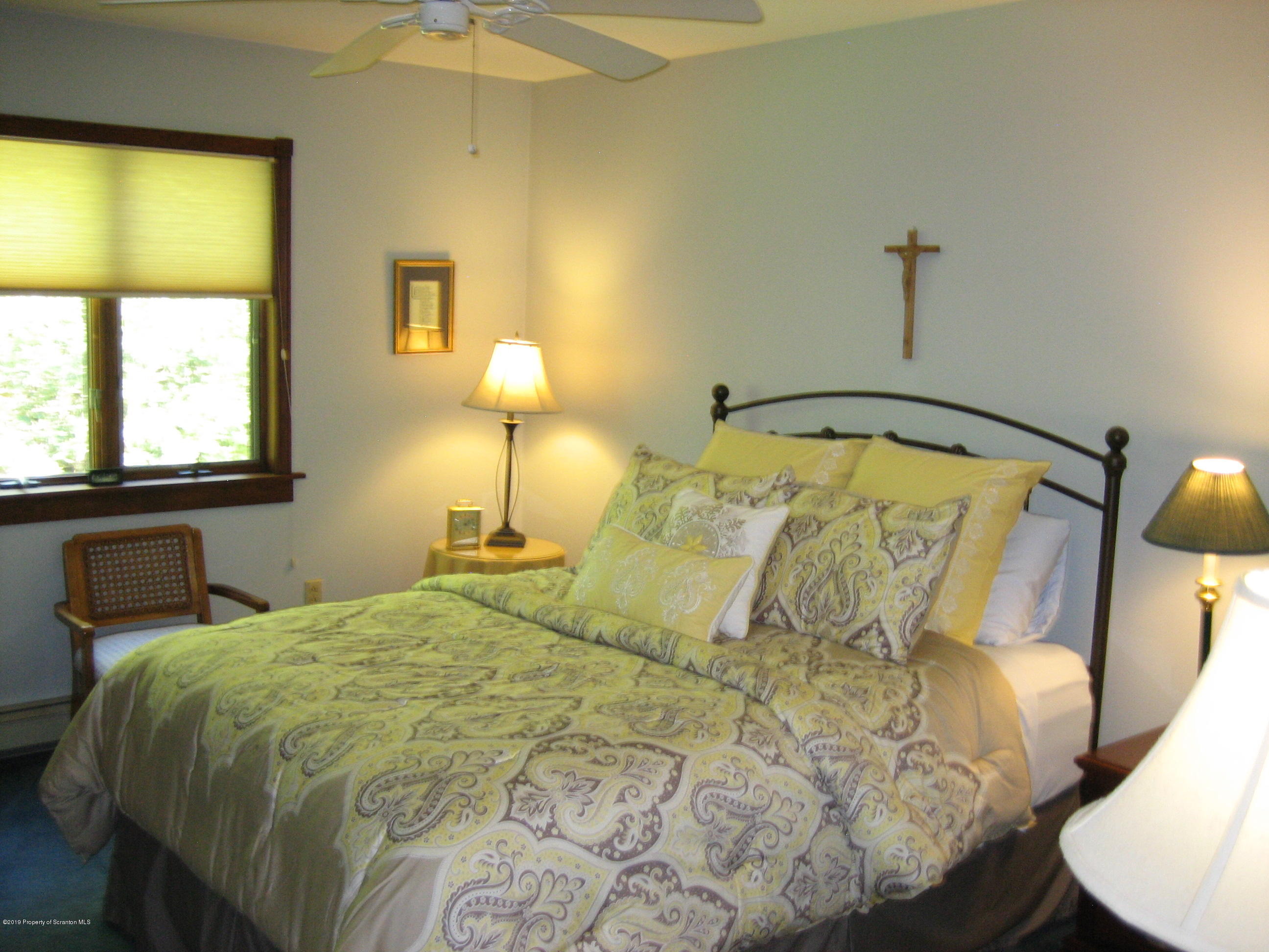 78 D Aberdeen Road Moscow, PA 18444 - Photo 22 of 70 a bedroom with a bed and wooden floor