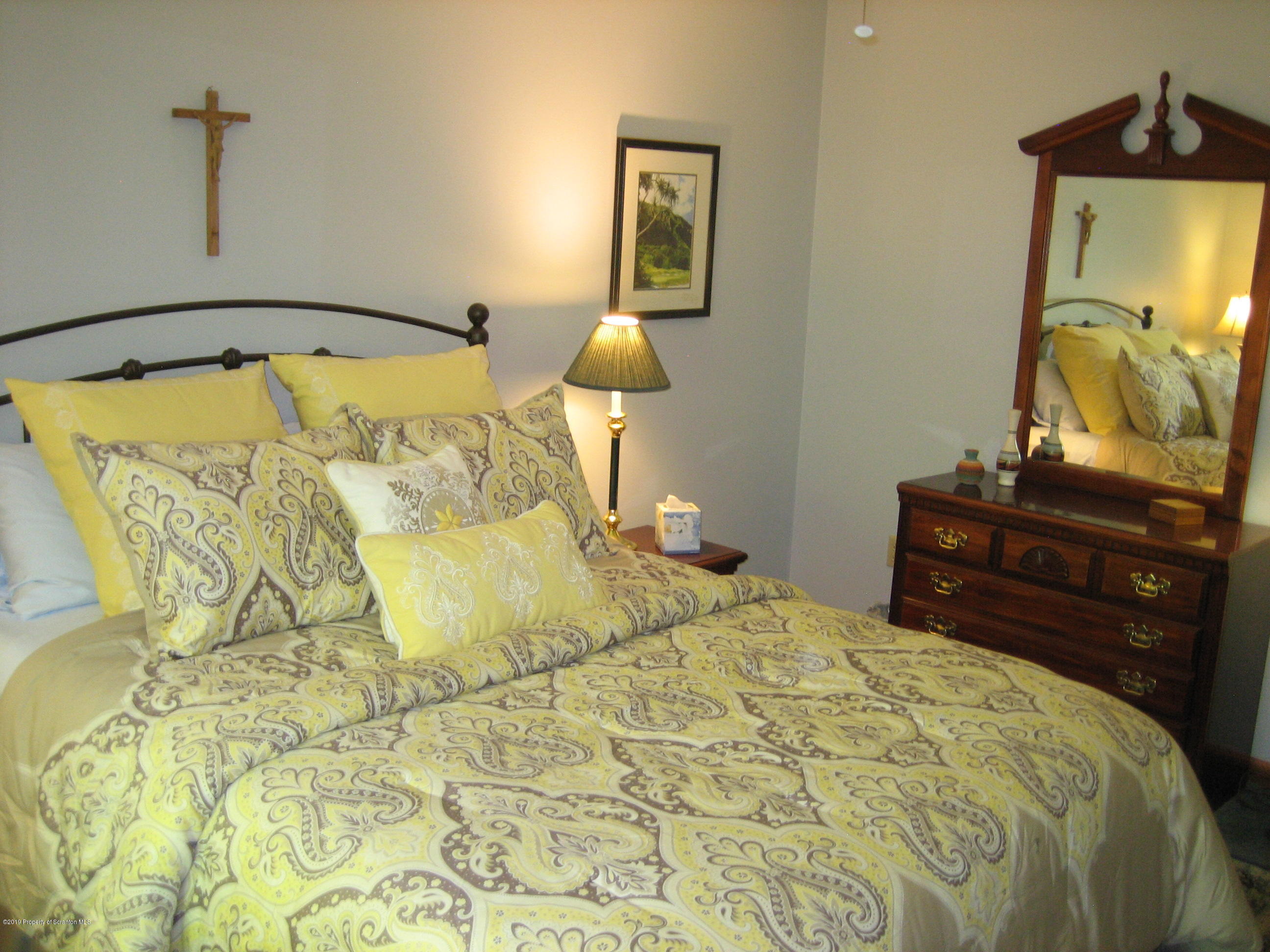 78 D Aberdeen Road Moscow, PA 18444 - Photo 23 of 70 a bedroom with a bed and lamp on the dresser