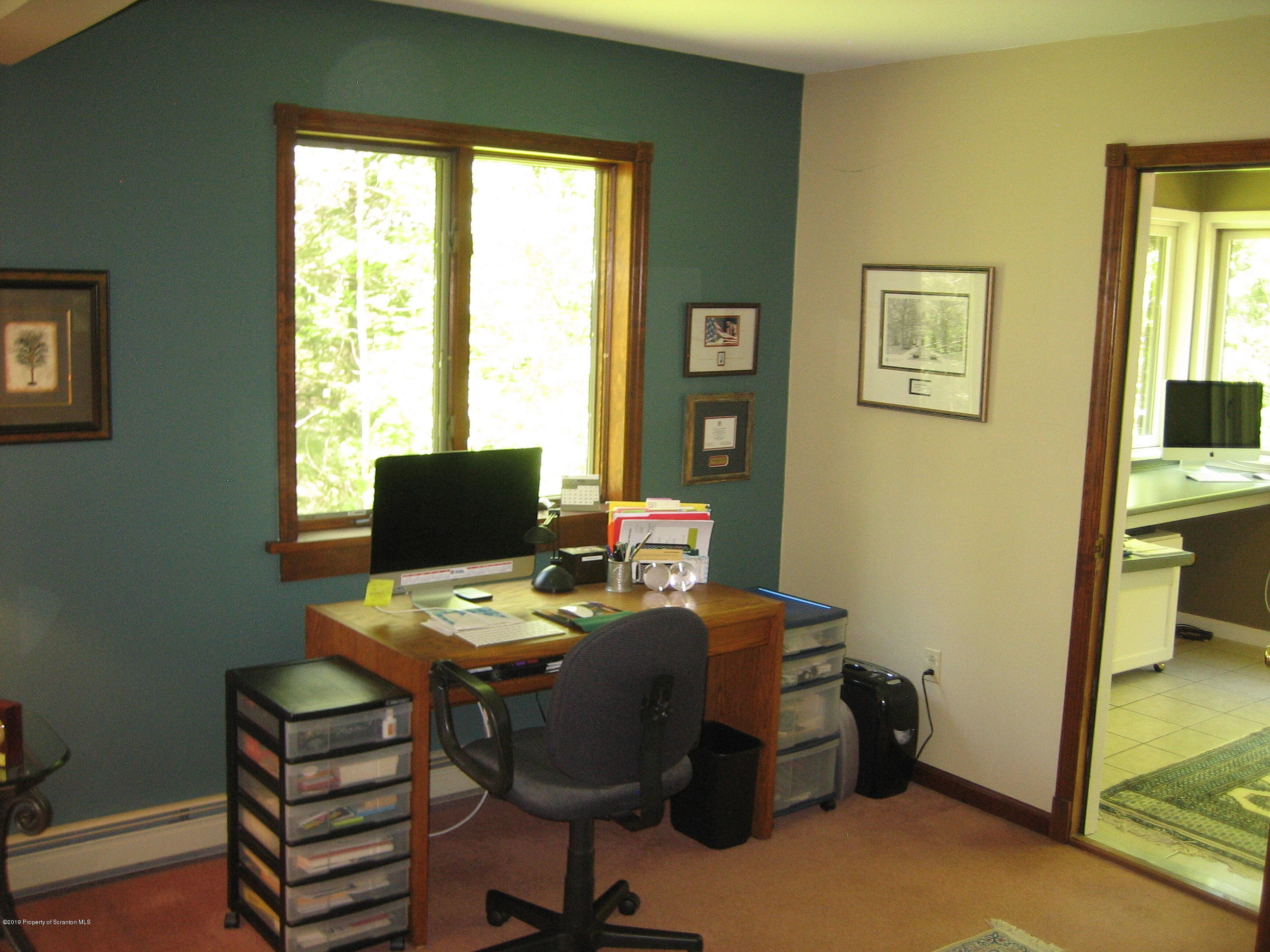 78 D Aberdeen Road Moscow, PA 18444 - Photo 27 of 70 a view of a workspace with furniture and a window