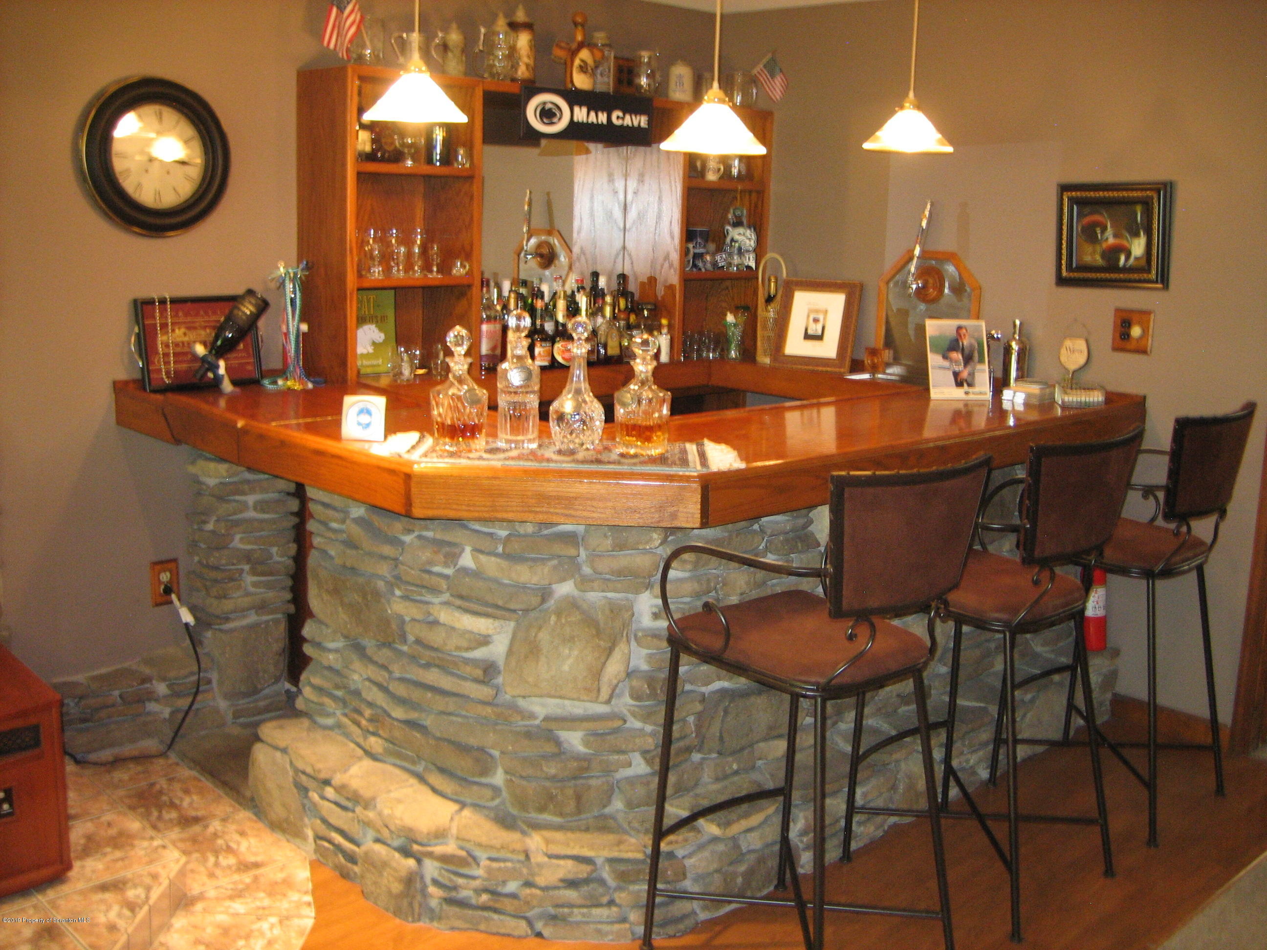 78 D Aberdeen Road Moscow, PA 18444 - Photo 30 of 70 a view of a dining room with furniture and chandelier