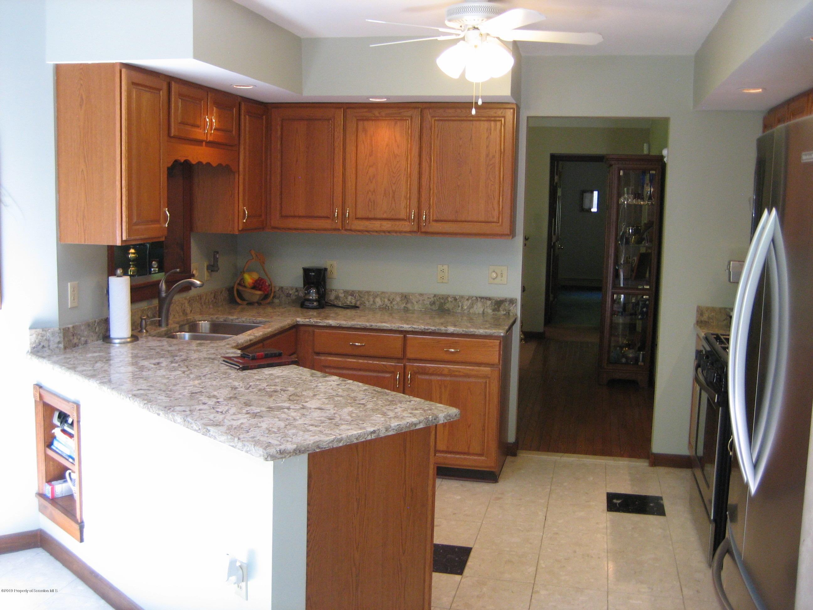 78 D Aberdeen Road Moscow, PA 18444 - Photo 4 of 70 a kitchen with stainless steel appliances granite countertop a sink refrigerator and cabinets