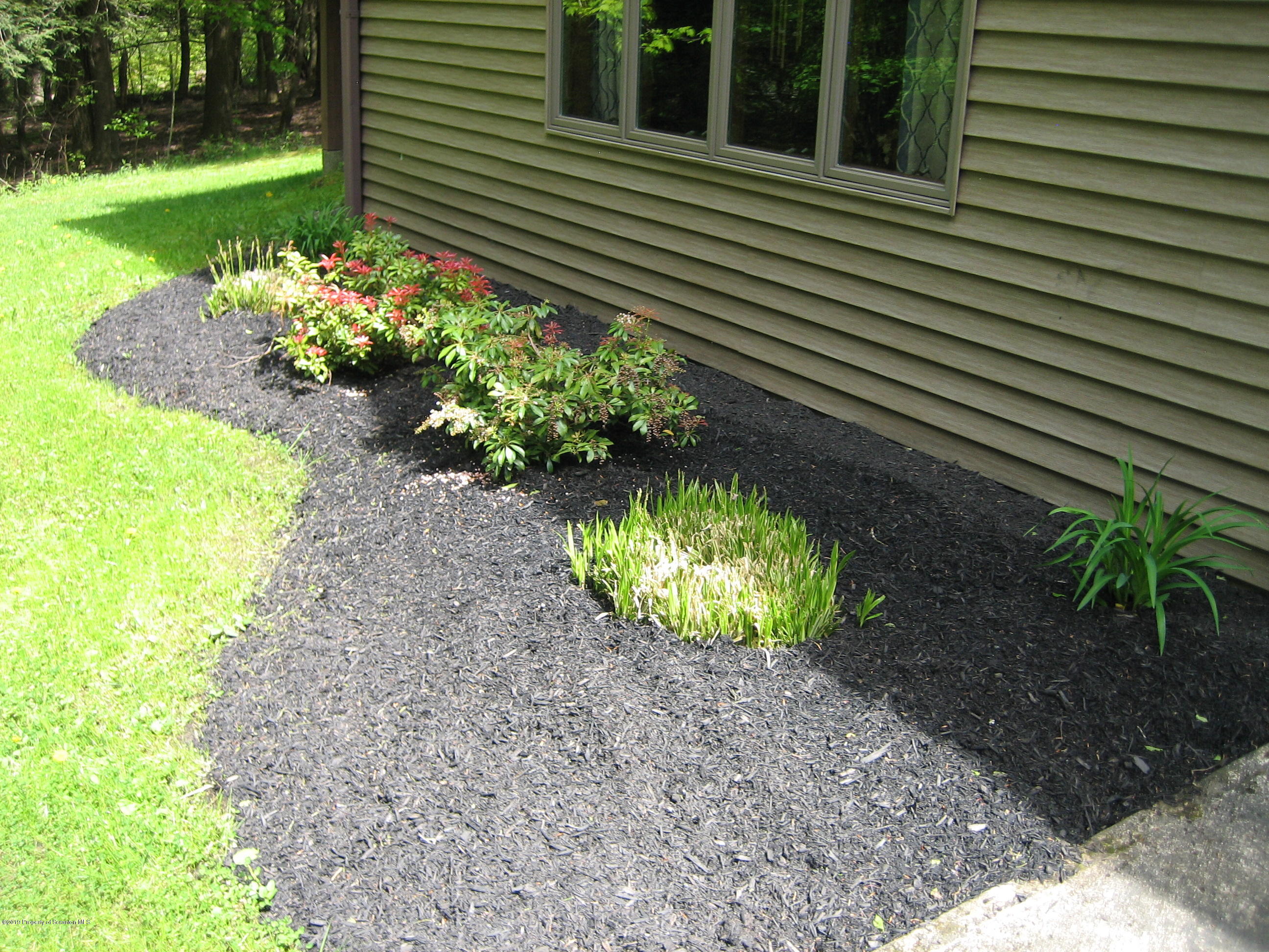 78 D Aberdeen Road Moscow, PA 18444 - Photo 57 of 70 a view of a backyard with a garden