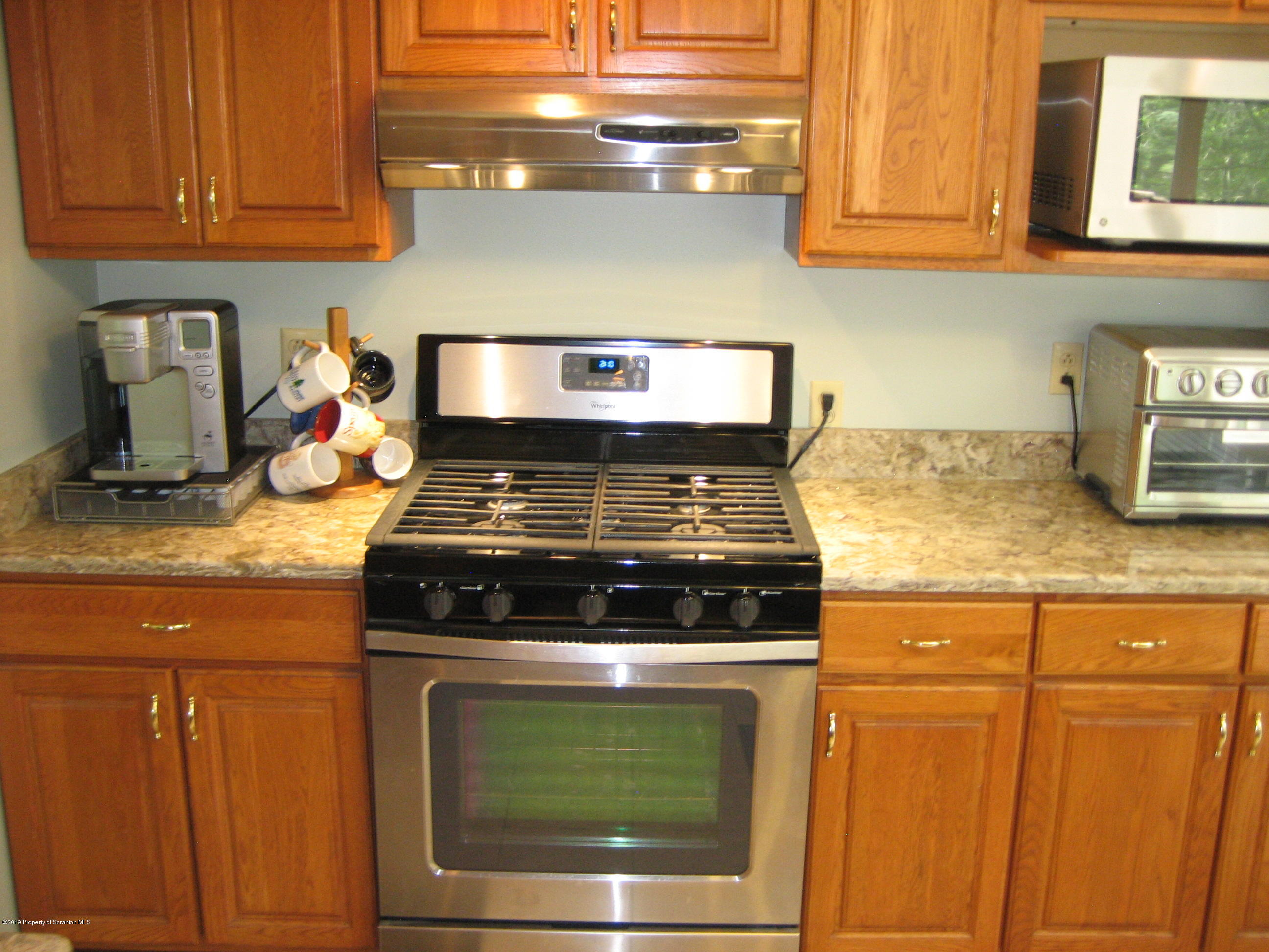 78 D Aberdeen Road Moscow, PA 18444 - Photo 7 of 70 a stove top oven sitting inside of a kitchen